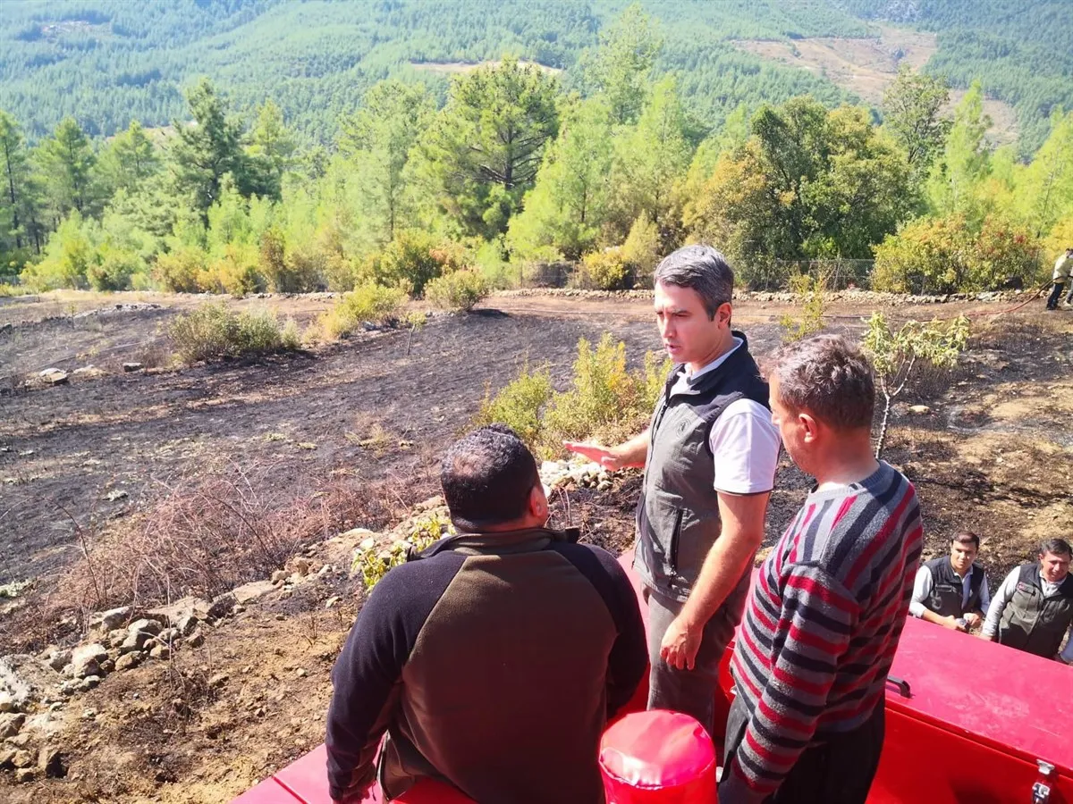 Bucak Kaymakamı KURUCA, Çamlık Köyünde çıkan ve kontrol altına alınarak söndürülen orman yangınının meydana geldiği bölgede incelemelerde bulundu